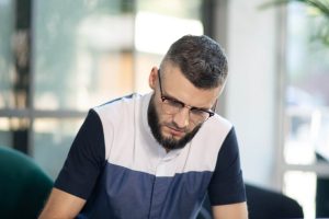 young-businessman-working-hard-in-the-office-2021-09-03-20-25-38-utc